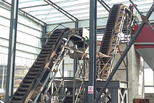 Bandtransportör på sidovägg